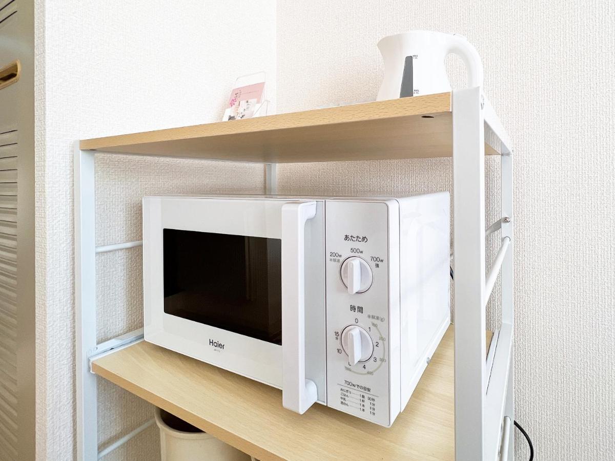 Ouchi Hotel Nishi-Tokaichi Хиросима Экстерьер фото